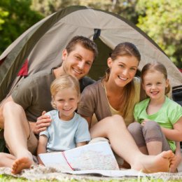 happy family members camping