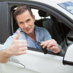 man looking excited to operate a vehicle accommodations automobile in Vancouver